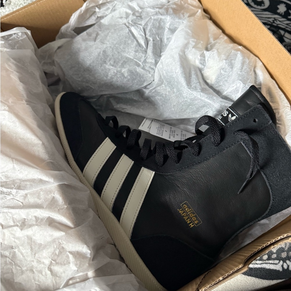Adidas Men's Black and White High-Top Sneakers